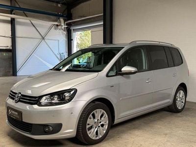Second-hand VW Touran Life 140 CP (102 kW) 2014 Argintiu Monovolum
