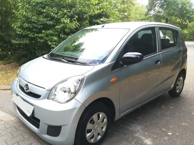 Gebraucht Daihatsu Cuore 69 PS (50 kW) 2009 Silber Kleinwagen