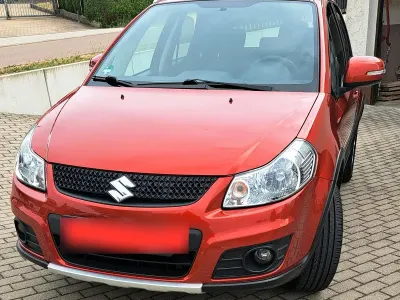 Gebraucht Suzuki SX4 120 PS (88 kW) 2013 Orange Limousine
