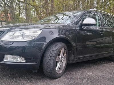 Second-hand Skoda Octavia 140 CP (102 kW) 2012 Negru Break