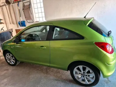 Gebraucht Opel Corsa 69 PS (50 kW) 2013 Grün Kleinwagen