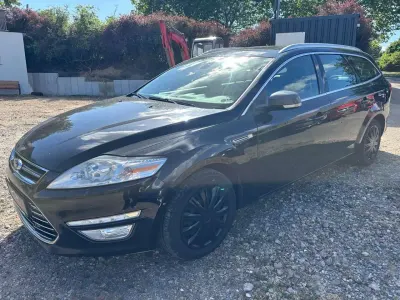 Gebraucht Ford Mondeo Titanium 163 PS (119 kW) 2014 Pantherschwarz metallic Kombi