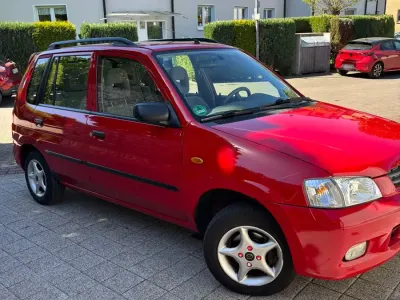 Second-hand Mazda Demio 64 CP (47 kW) 2000 Roșu Hatchback