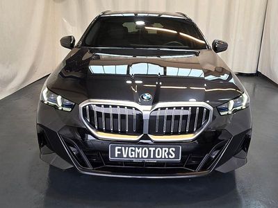 Gebraucht BMW 520 M Sport 197 PS (144 kW) 2024 Grau Kombi