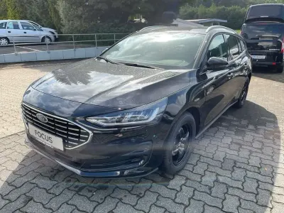 Gebraucht Ford Focus Titanium 125 PS (91 kW) 2024 Lackierung agate black metallic schwarz Kombi