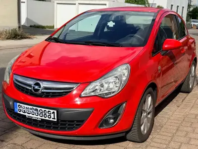 Gebraucht Opel Corsa 69 PS (50 kW) 2012 Rot Kleinwagen