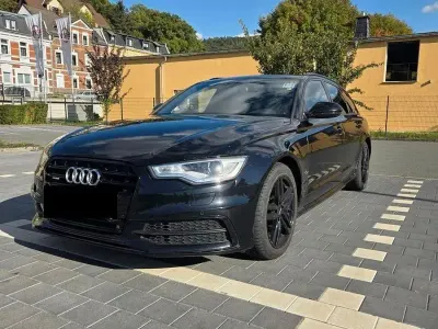 Używany Audi A6 Sport 245 KM (180 kW) 2013 Czarny Kombi