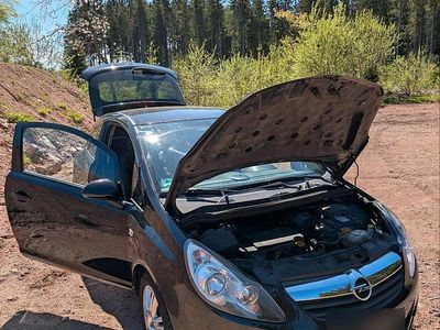 Używany Opel Corsa 69 KM (50 kW) 2010 Czarny Hatchback