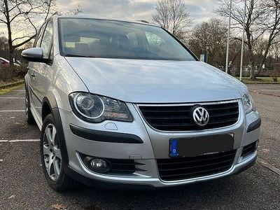 Second-hand VW Touran Cross 140 CP (102 kW) 2009 Argintiu Monovolum