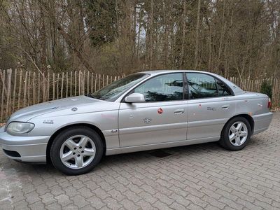 Second-hand Opel Omega 144 CP (105 kW) 2003 Argintiu Berlinǎ