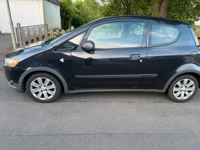 Gebraucht Mitsubishi Colt 75 PS (55 kW) 2010 Schwarz Kleinwagen