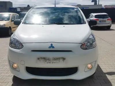 Gebraucht Mitsubishi Space Star 71 PS (52 kW) 2013 Weiß Kleinwagen