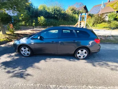 Gebraucht Opel Astra 165 PS (121 kW) 2011 Grau Kombi