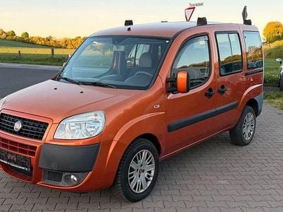 Second-hand Fiat Doblò Family 120 CP (88 kW) 2009 Portocaliu Monovolum