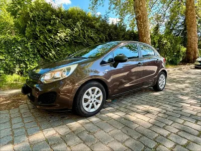 Gebraucht Kia Rio 85 PS (62 kW) 2014 Braun Kleinwagen