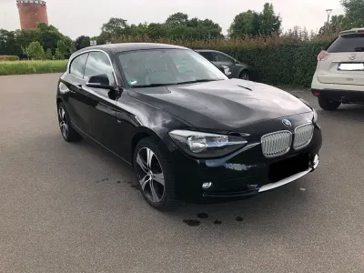 Gebraucht BMW 116 Sport Line 136 PS (100 kW) 2012 Schwarz Kleinwagen
