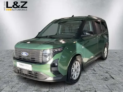 Gebraucht Ford Tourneo Courier Titanium 125 PS (91 kW) 2024 Bursting green Van / Kleinbus