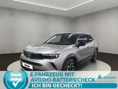Gebraucht Opel Mokka-e Elegance 100 kW (136 PS) 2022 Kontrast grau / quarz silber SUV
