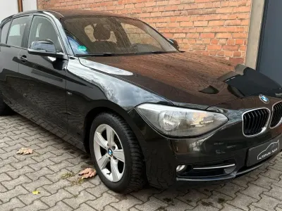 Używany BMW 116 Sport Line 136 KM (100 kW) 2012 Czarny Hatchback