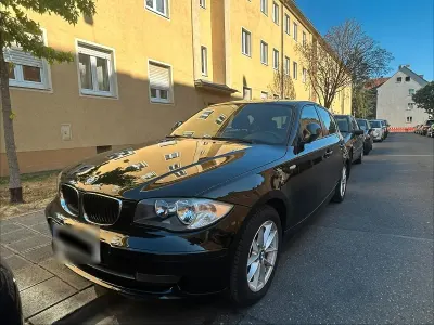 Gebraucht BMW 116 122 PS (89 kW) 2010 Schwarz Kleinwagen