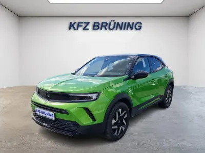 Gebraucht Opel Mokka 136 PS (100 kW) 2024 Matcha grün metallic / dac (metallic) SUV