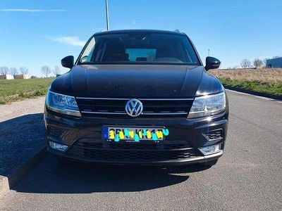 Second-hand VW Tiguan Sound 125 CP (91 kW) 2017 Negru SUV