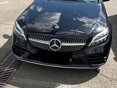 Second-hand Mercedes C200 AMG line 150 CP (110 kW) 2018 Negru Break
