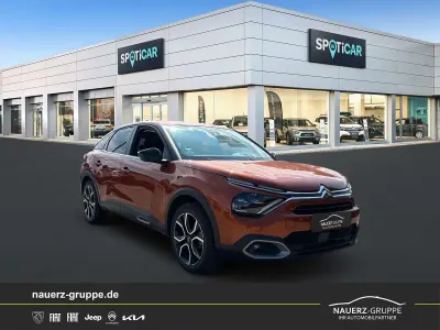 Gebraucht Citroën e-C4 Shine 100 kW (136 PS) 2022 Pulsorange metallic Limousine