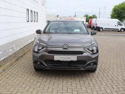 Gebraucht Citroën e-C4 Shine 100 kW (136 PS) 2023 Platinumgrau Limousine