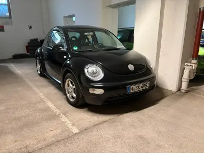 Gebraucht VW New Beetle 75 PS (55 kW) 2003 Schwarz Kleinwagen