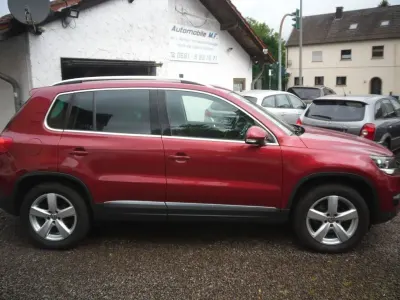 Używany VW Tiguan Sportline 122 KM (89 kW) 2012 Czerwony SUV
