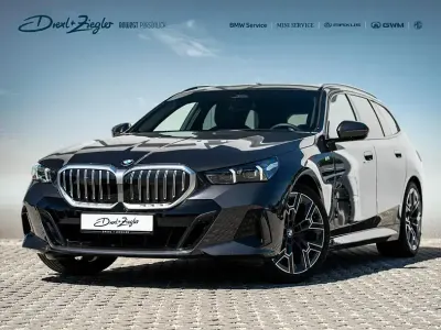 Gebraucht BMW 520 M Sport 197 PS (144 kW) 2025 Sophistograu brillanteffekt metallic Kombi