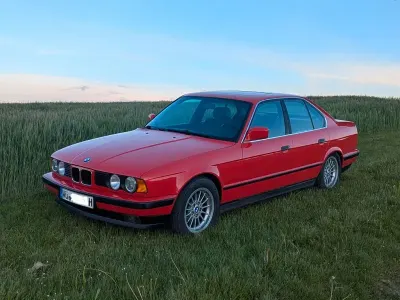 Używany BMW 520 129 KM (94 kW) 1990 Czerwony Sedan/Limuzyna