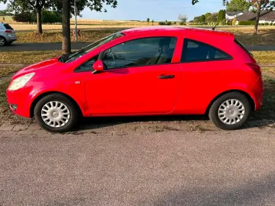 Gebraucht Opel Corsa 80 PS (58 kW) 2009 Rot Kleinwagen