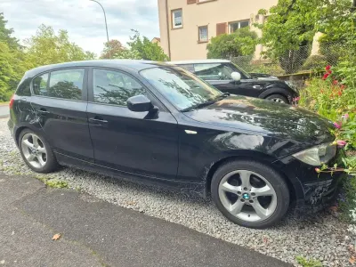 Gebraucht BMW 116 116 PS (85 kW) 2010 Schwarz Kleinwagen