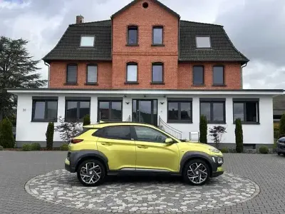 Gebraucht Hyundai Kona Style 141 PS (103 kW) 2021 Acid yellow / mic SUV