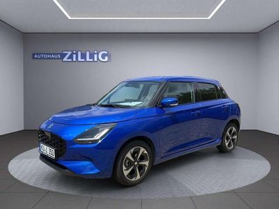 Gebraucht Suzuki Swift Comfort+ 83 PS (61 kW) 2024 Frontier blue pearl metallic Kleinwagen