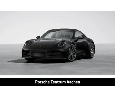 Gebraucht Porsche 911 Carrera 394 PS (289 kW) 2025 Tiefschwarzmetallic Coupé