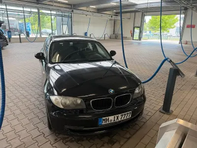 Gebraucht BMW 116 122 PS (89 kW) 2010 Schwarz Kleinwagen