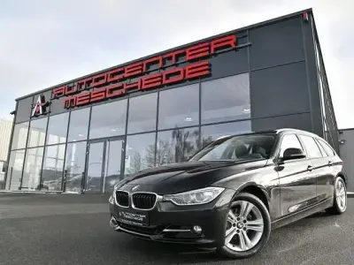 Gebraucht BMW 320 Sport Line 184 PS (135 kW) 2012 Black sapphire metallic Kombi