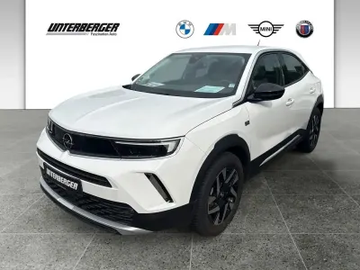 Gebraucht Opel Mokka-e Elegance 100 kW (136 PS) 2022 Jade weiss/arktis weiss SUV