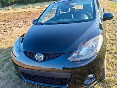 Gebraucht Mazda 2 Inclusive 75 PS (55 kW) 2009 Schwarz Kleinwagen