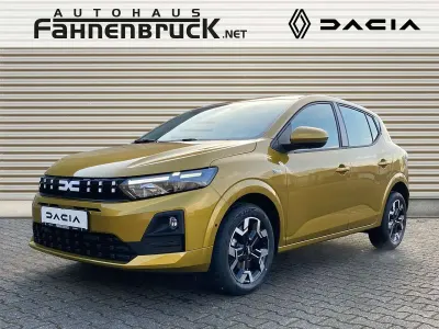Neu Dacia Sandero Journey 101 PS (74 kW) 2026 Amber yellow Limousine