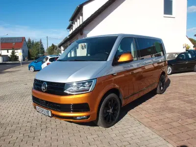 Gebraucht VW Multivan Generation Six 204 PS (150 kW) 2018 Reflexsilber / phönix orange Van / Kleinbus