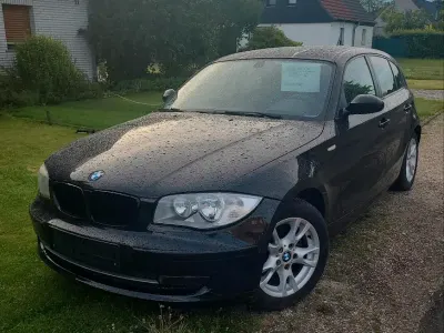 Gebraucht BMW 116 122 PS (89 kW) 2009 Schwarz Kleinwagen