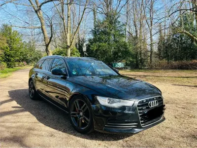 Używany Audi A6 Sport 245 KM (180 kW) 2013 Czarny Kombi