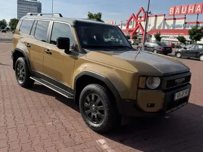 Gebraucht Toyota Land Cruiser 204 PS (150 kW) 2025 Beige SUV