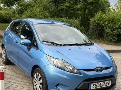 Używany Ford Fiesta 68 KM (50 kW) 2011 Niebieski Sedan/Limuzyna