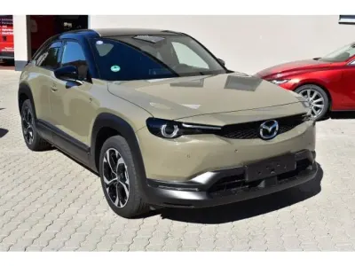 Gebraucht Mazda MX30 170 PS (125 kW) 2024 Multitone zircon sand (metallic) SUV