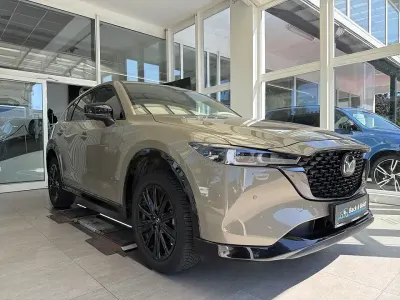Gebraucht Mazda CX-5 Homura-Line 194 PS (142 kW) 2023 Zircon sand SUV